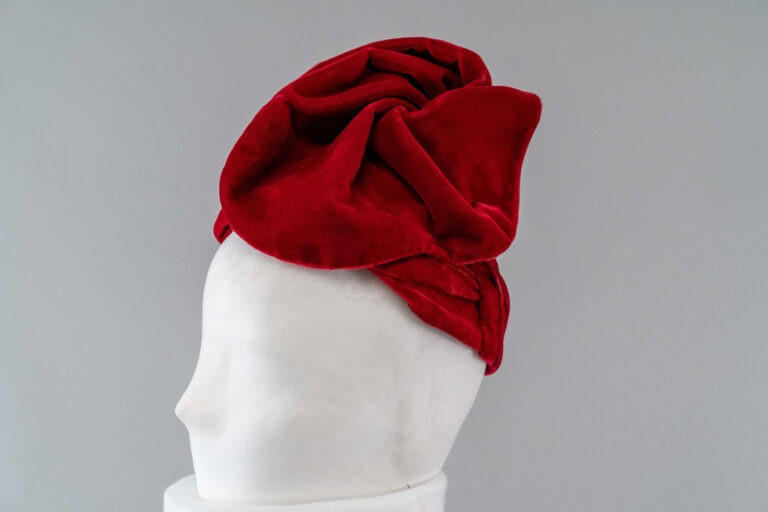 Photo of Dark Red Velvet Turban with High Standing Scallop-Edged Swirl