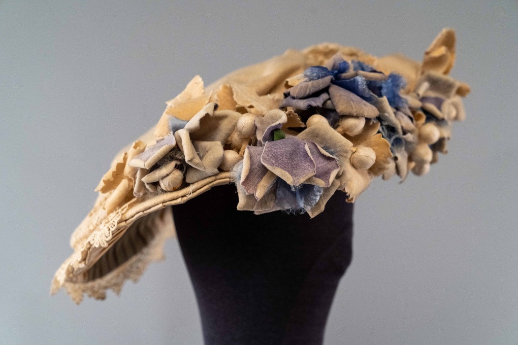 Photo of White Felt Wedding Hat Decorated with Velour Flowers